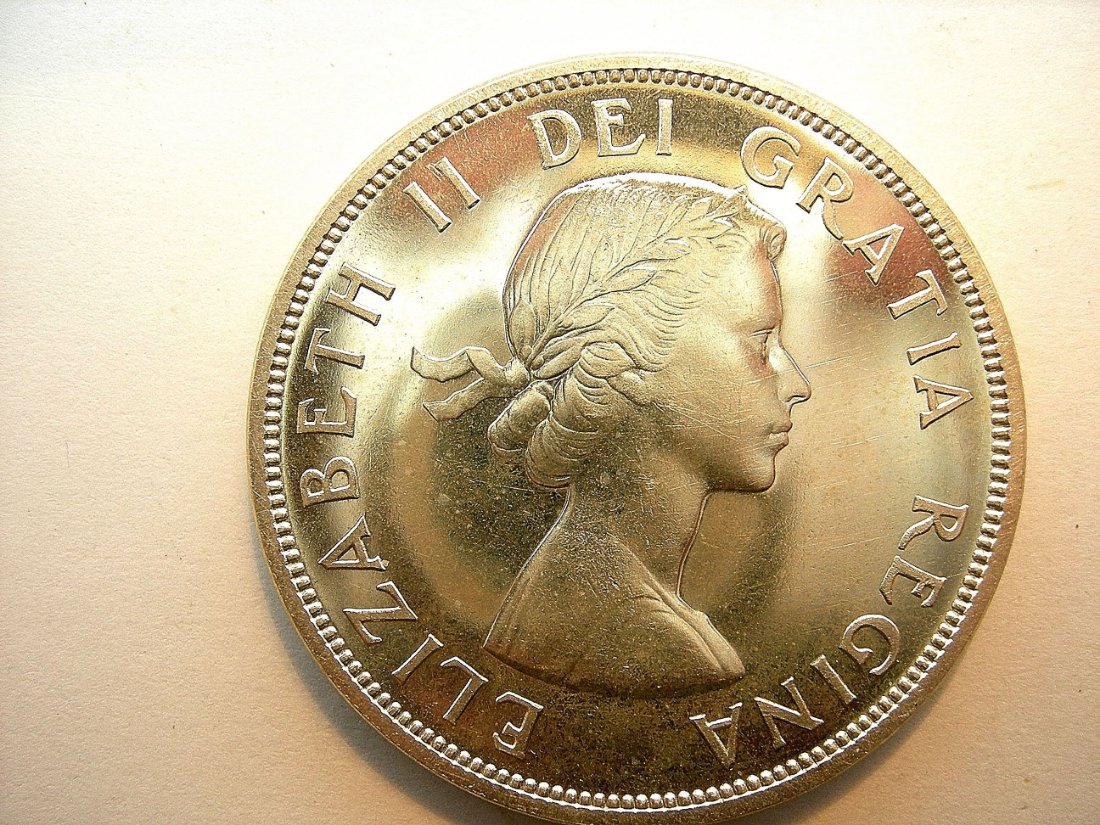 Was-Wondering-What-Causes-This-Kind-Of-Colour-To-A-Silver-Dollar-?
