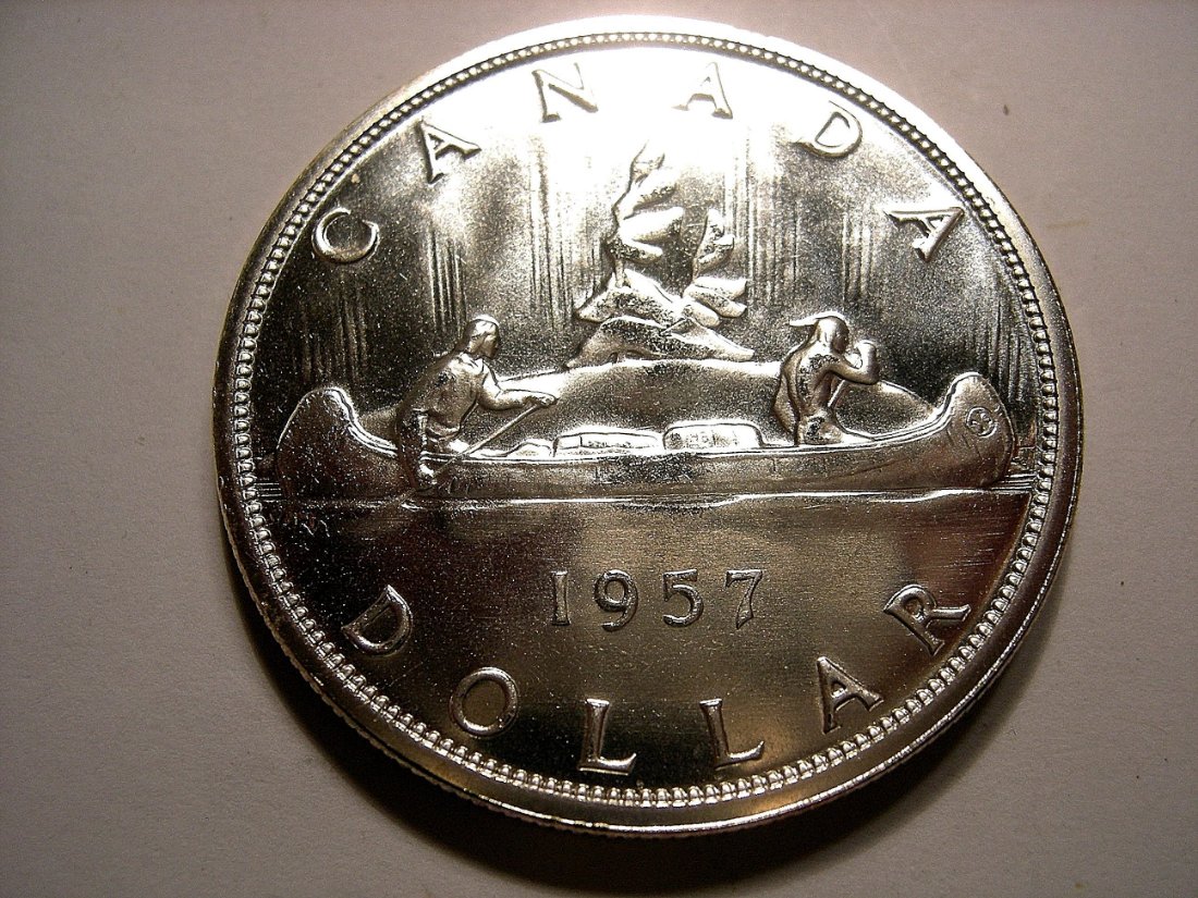 Was-Wondering-What-Causes-This-Kind-Of-Colour-To-A-Silver-Dollar-?