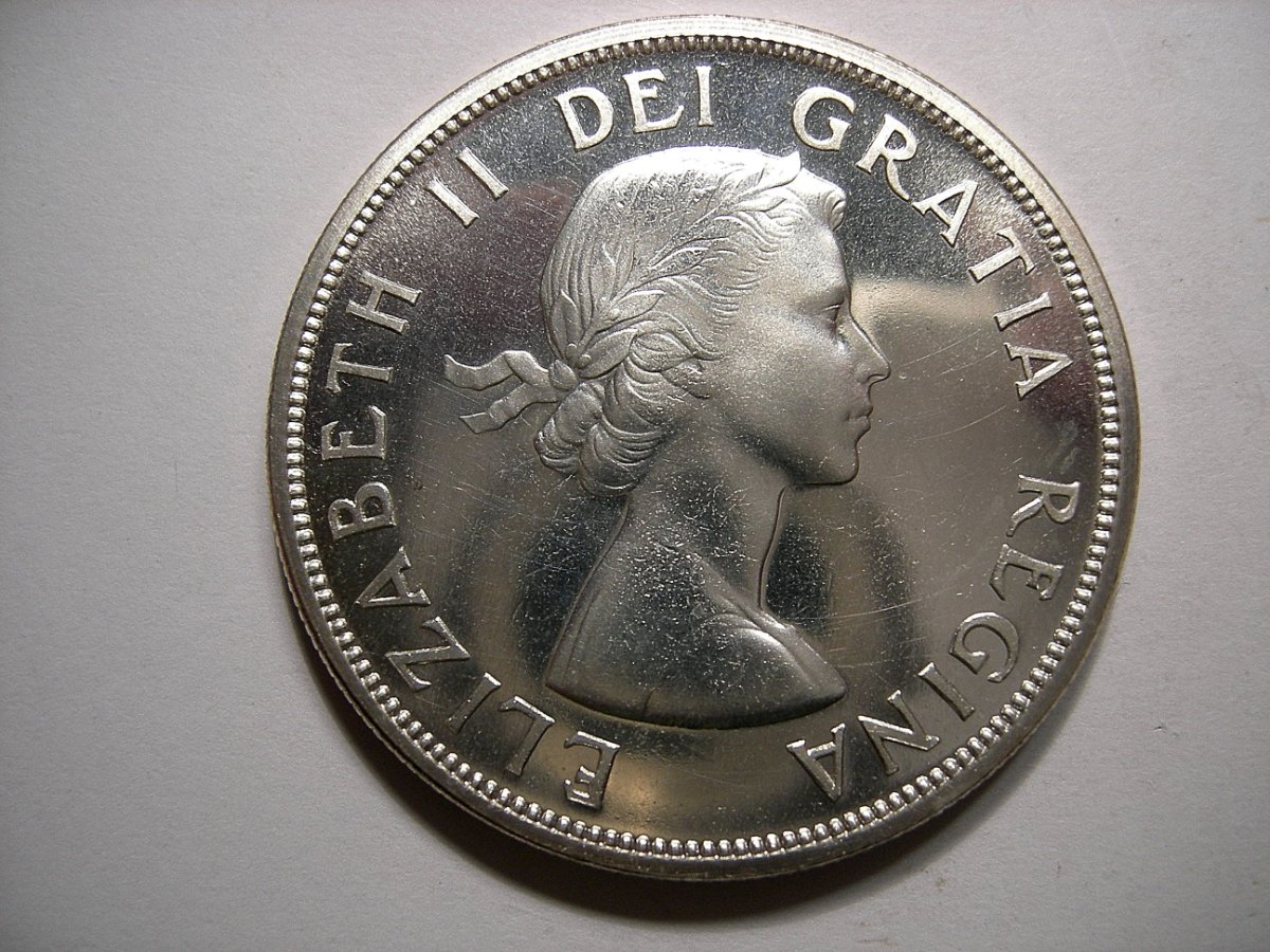 Was-Wondering-What-Causes-This-Kind-Of-Colour-To-A-Silver-Dollar-?