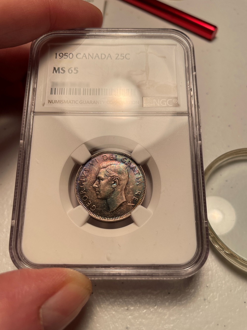 A-Canadian-1950-25c-Draped-In-Bazooka-Blue-And-Pink