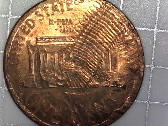 Is-This-2000-Penny-Damaged-Enviromentally-Or-By-Mint