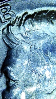 1969-Kennedy-Half-Cracked-Rim?-Doubling?-Head?