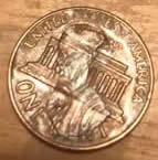 Penny-With-Nickel-Stamped-On-It