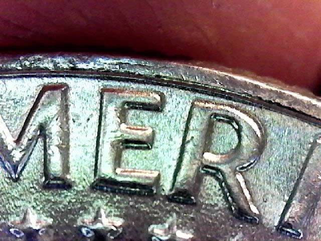 1969-D-Business-Strike-Kennedy-Half---Straight-G-Vs.-Flared-G