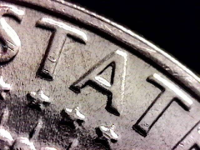 1969-D-Business-Strike-Kennedy-Half---Straight-G-Vs.-Flared-G