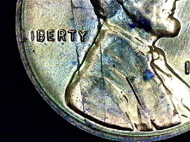 Laminations-Only-On-Circulated-Coins?