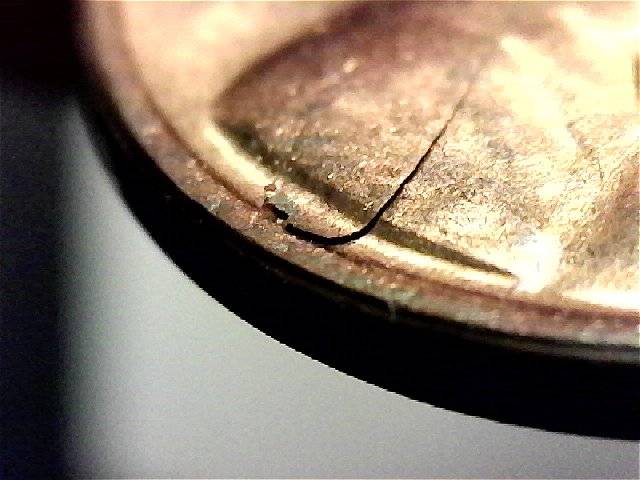 Laminations-Only-On-Circulated-Coins?