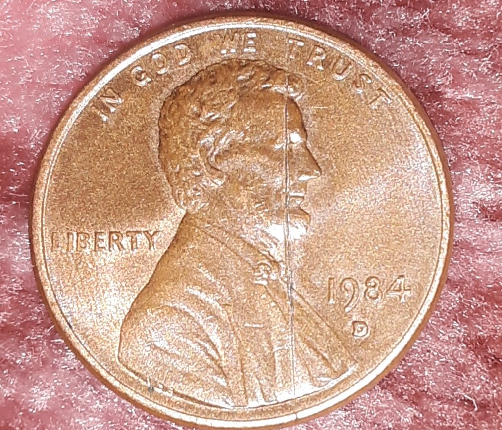 1984-D-Penny-May-Be-Struck-Through?-Your-Opinion?-Thanks!