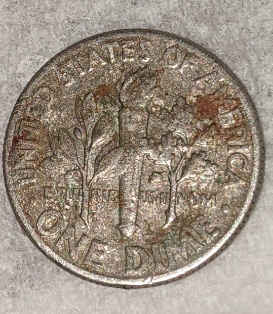 Is-This-Post-Mint-Damage-Or-Some-Sort-Of-Strike-Through-Or-Just-Pareidolia?-On-My-73-Roosevelt-Dime?