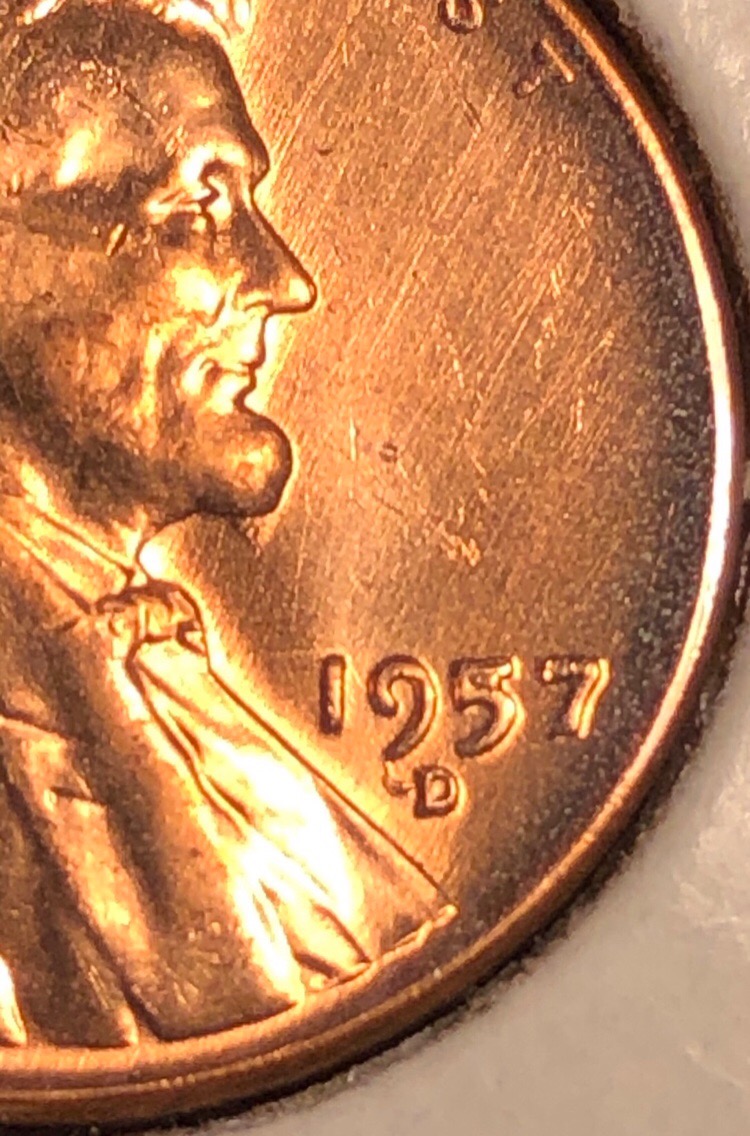 1957-D-LWC-Die-Break-On-Head,-Date,-And-What-Looks-Like-A-Wing-On-The-MM?