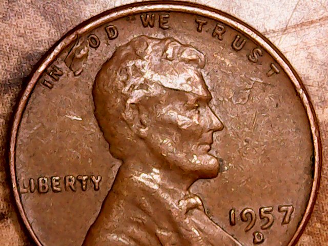 1957-D-LWC-Struck-Through-Debris-Or-Just-Lamination-Issue?