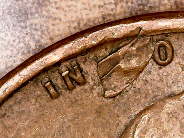1957-D-LWC-Struck-Through-Debris-Or-Just-Lamination-Issue?