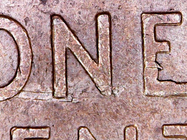 Need-Help-With-A-1945-D-LWC-Possible-Struck-Through-Staple-Or-Metal-Scrap?