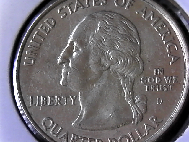 Alska-State-Quarter-Has-Something-Weird-On-The-Reverse