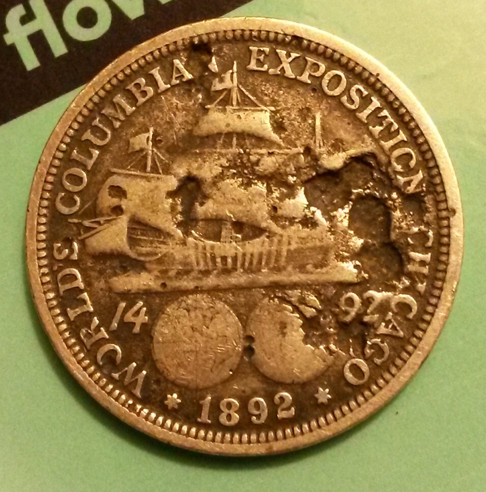 Possible-1892-Columbian-Exposition-Half-Dollar-Lamination-Error-On-Reverse