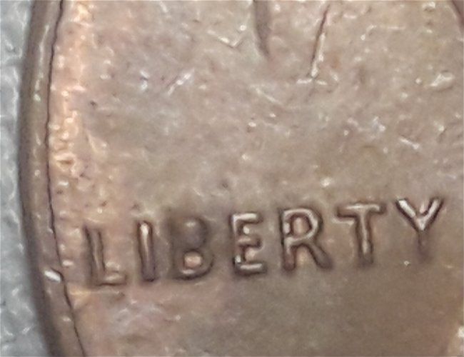 1983-P-Cent-Die-Crack-Reverse-And-Filled-In-B-Liberty-On-Obverse