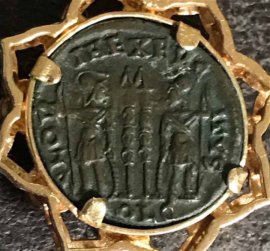 Old-Coin-In-A-Clasp.