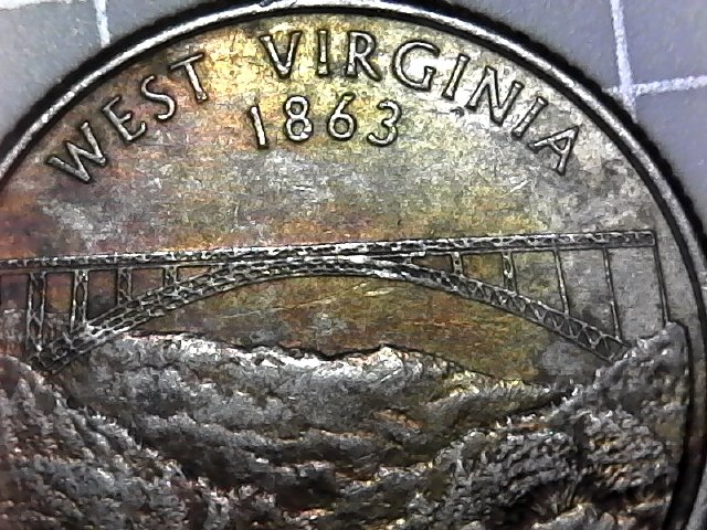 Slight-Missing-Clad-On-Quarter?