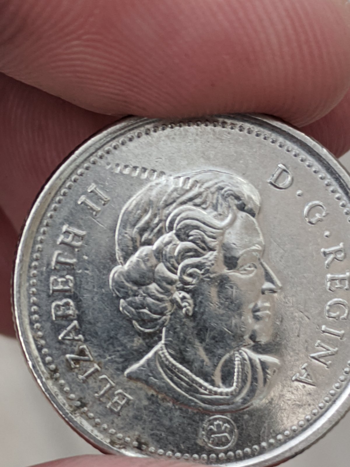 2007-Quarter.-Is-This-Coin-Struck-Through-A-Coin-Rim-Or-Something-Or-PMD?