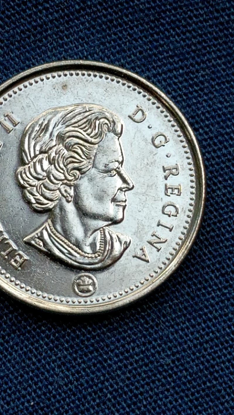 2016-Canadian-Nickel-Extra-Metal-On-First-A-In-Canada,-What-Is-This-Called?
