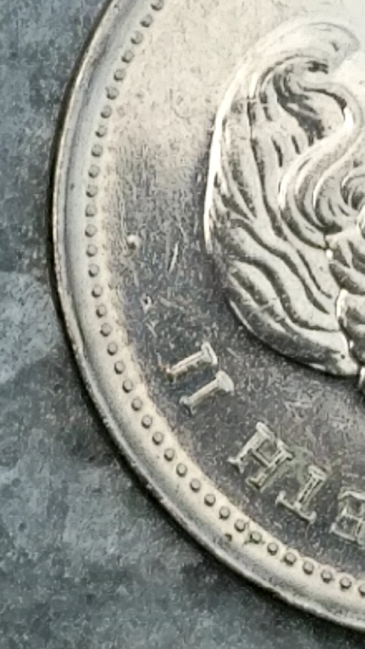 First-Dot-Coin-IV-Found.-Dot-Above-Queen's-Hair.-Is-This-Considered-An-Erro