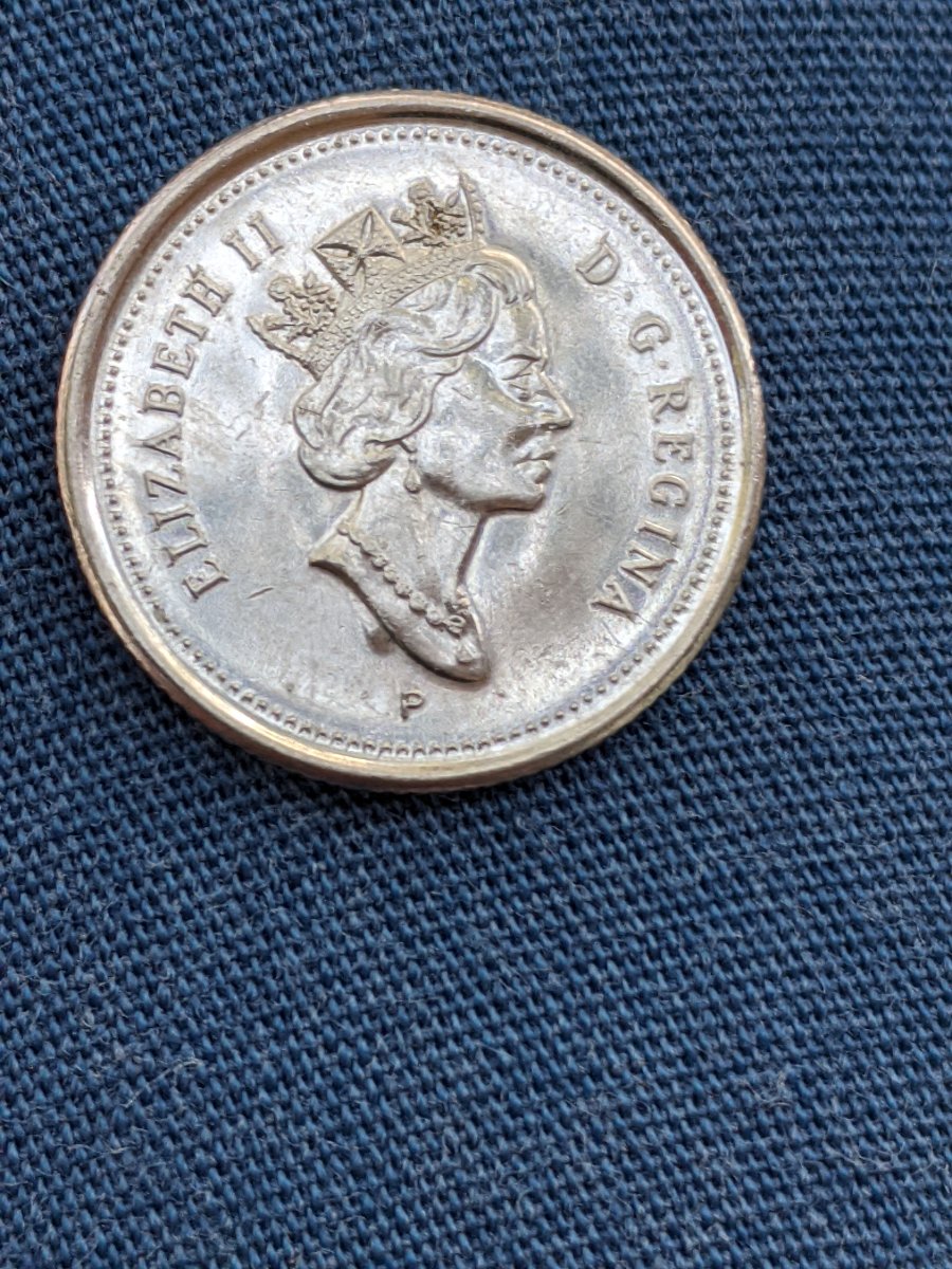 2001-Dime,-Die-Chip-Or-Gas-Bubble?