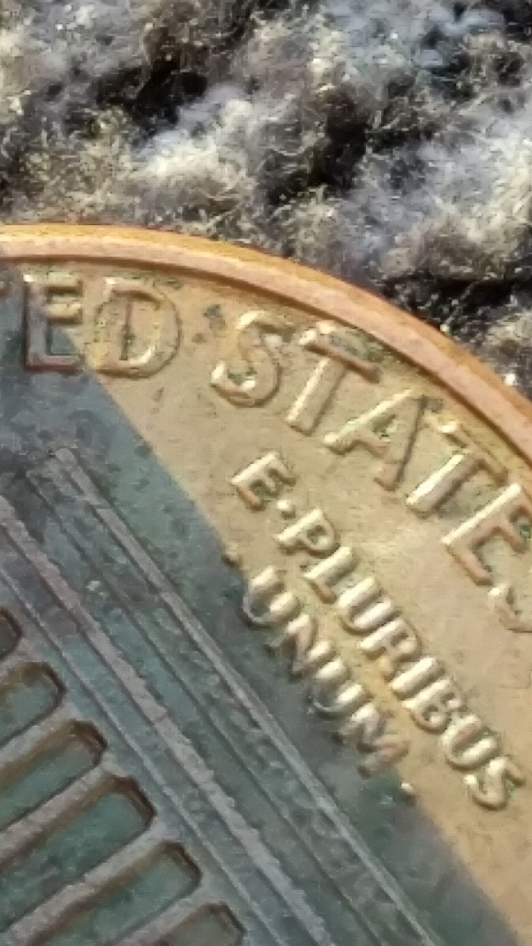 Is-This-Just-A-Die-Chip-Running-Along-The-Top-Of-T-In-States?-1991-Cent