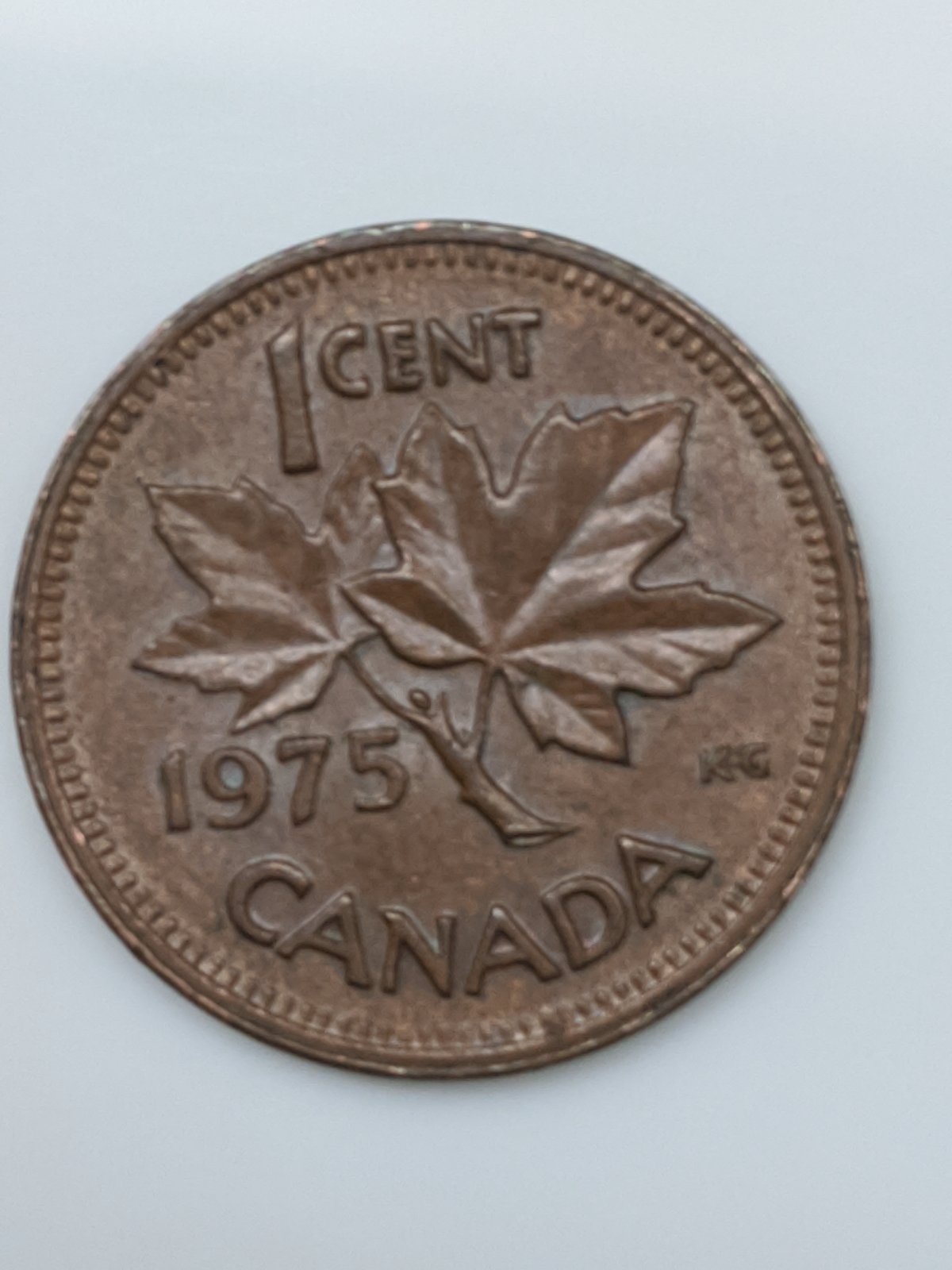 Is-The-A-Mad-Coin-With-A-Rim-Fin-On-1975-Penny.