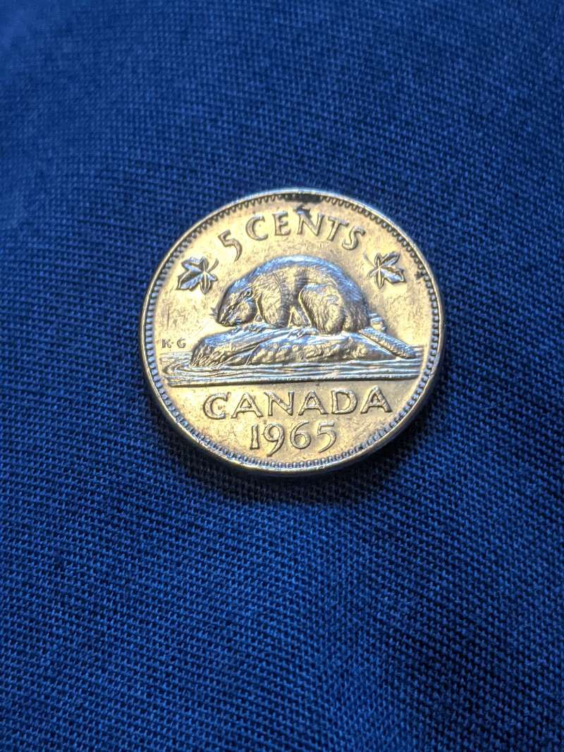 Pretty-Sure-I-Found-A-1965-High-Relief-5-Cent.