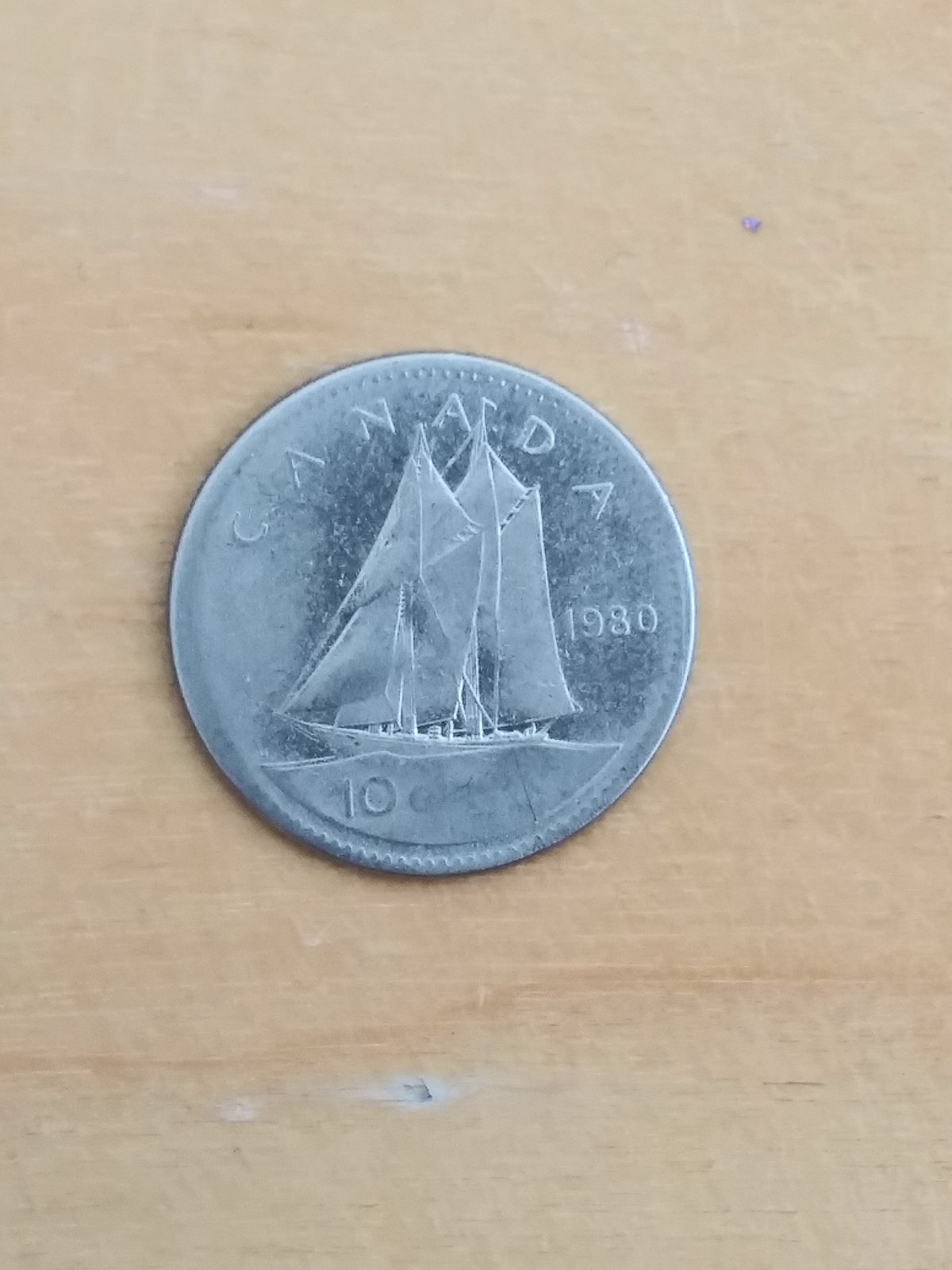 1980-10-Cents.-Grease-Filled-Die,-Possible-Weak-Strike-Or-PMD?