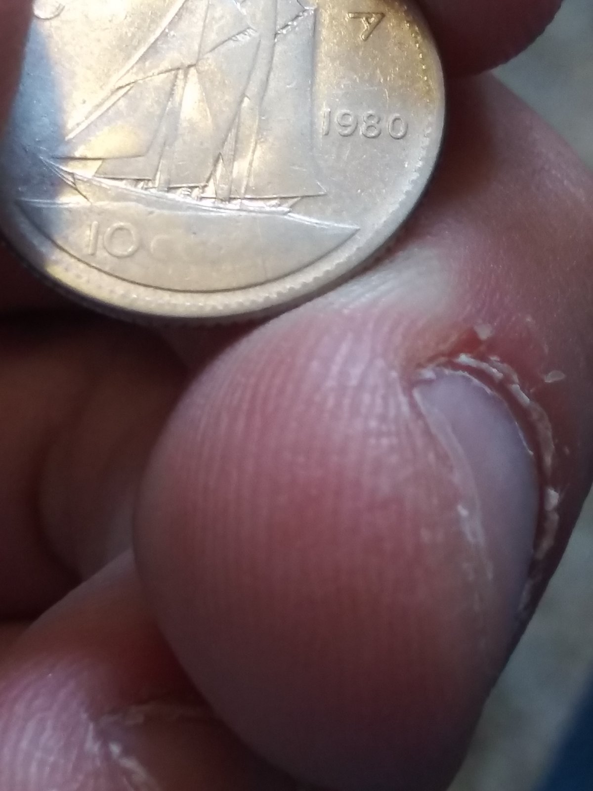 1980-10-Cents.-Grease-Filled-Die,-Possible-Weak-Strike-Or-PMD?