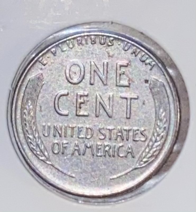 Small-Rust-Spots-On-Unc-1943-Steel-Penny