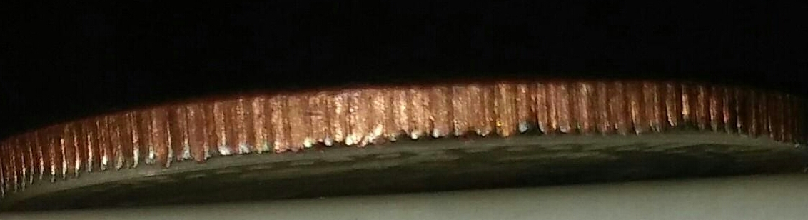 1995-Kennedy-Half-Dollar-Strange-Edge-Reeding