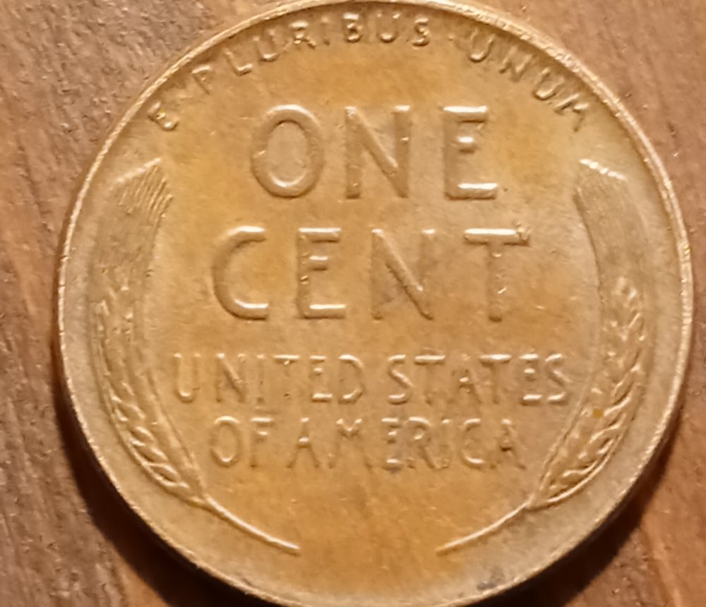 1957-D-Wheat-Penny-With-Funny-Looking-Date-Help?