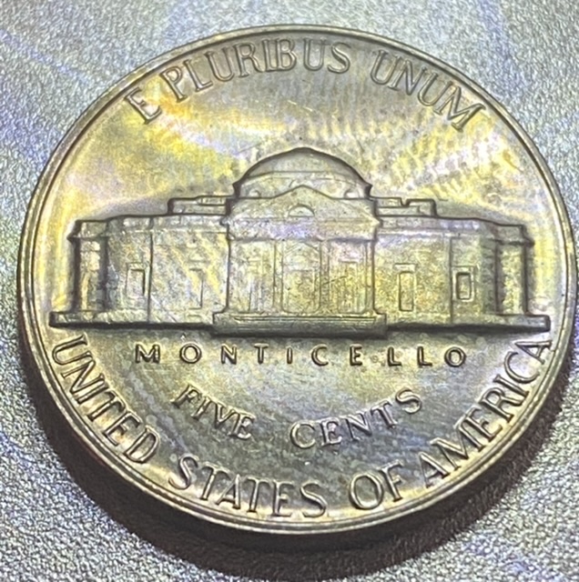 Removed-This-1969-S-Jefferson-Nickel-From-Mint-Coin-Set.-Can-You-Explain-The-Print?