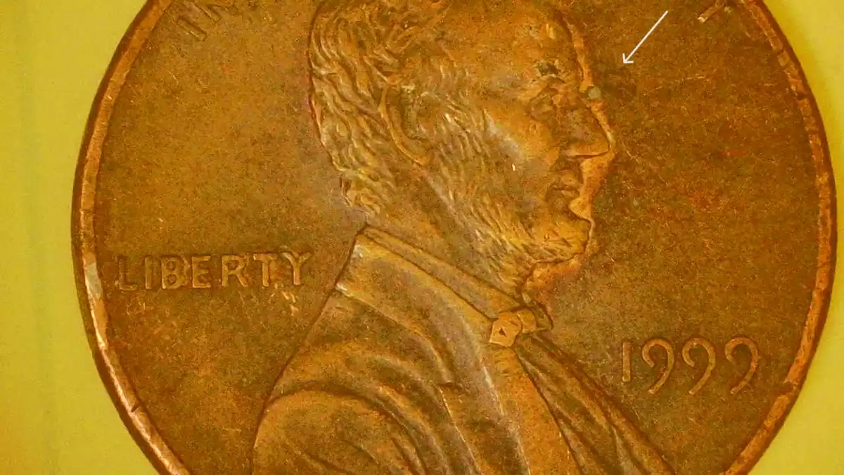 Bullet-Exiting-Lincoln's-Eye-On-1999-Penny.-Looks-Cool.
