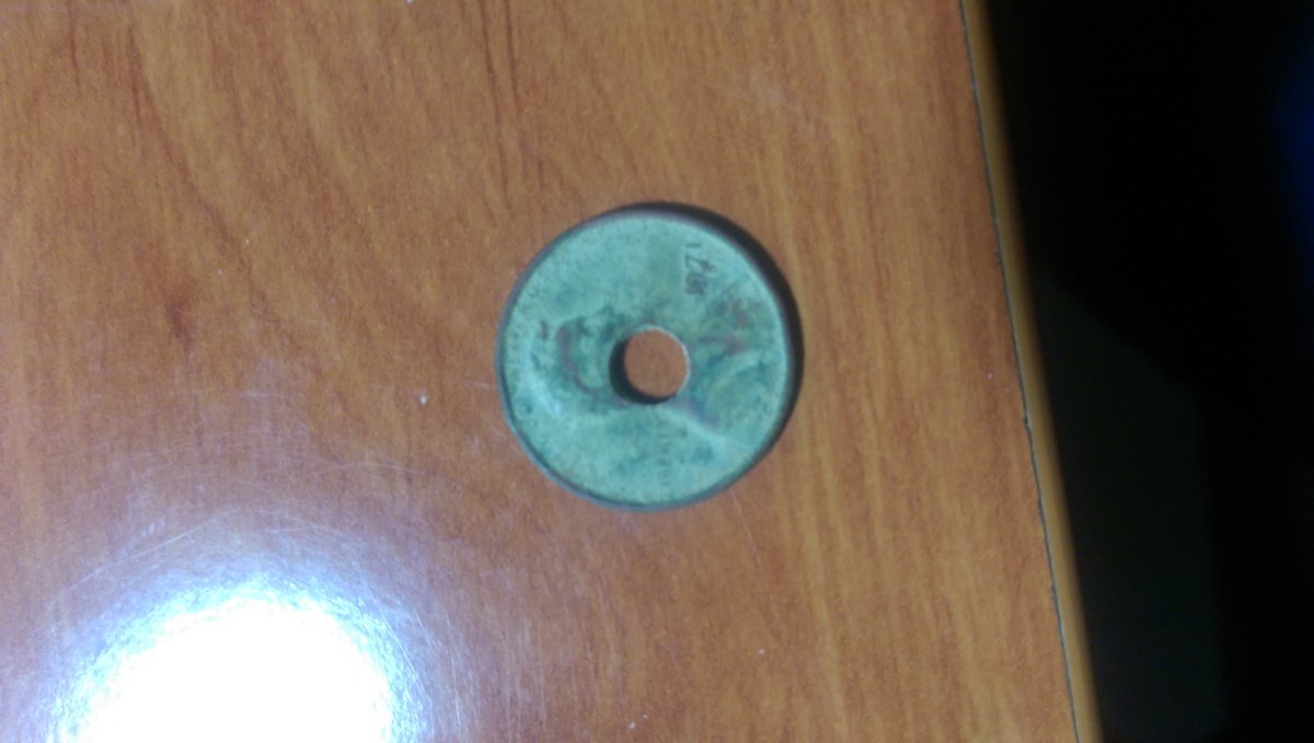 1971-D-Mint-U.s-Penny-With-Hole-Right-In-The-Center.