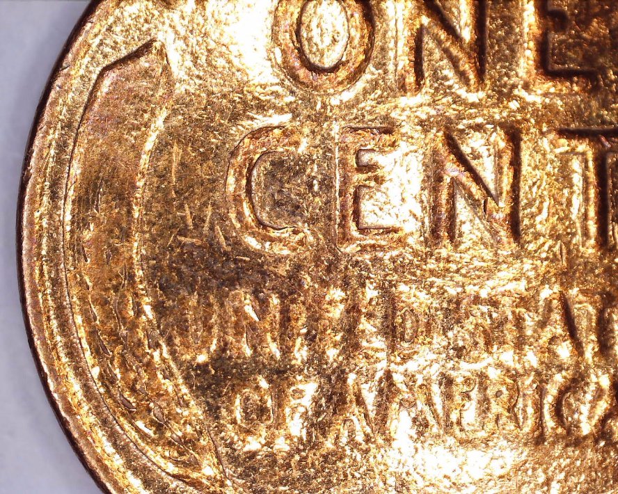 Strange-Non-Steel-1943-Cent-And-Another-Strange-1945-One-Cent-Coin