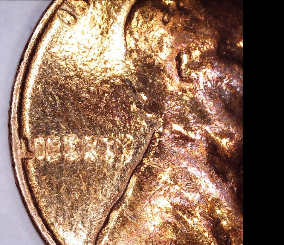 Strange-Non-Steel-1943-Cent-And-Another-Strange-1945-One-Cent-Coin