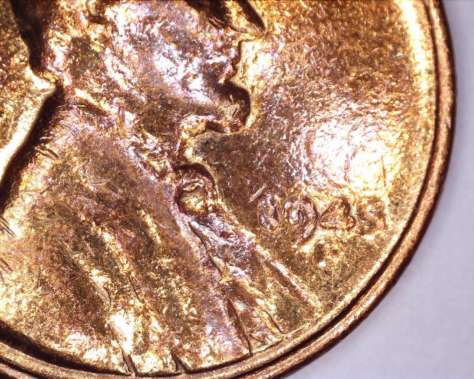 Strange-Non-Steel-1943-Cent-And-Another-Strange-1945-One-Cent-Coin