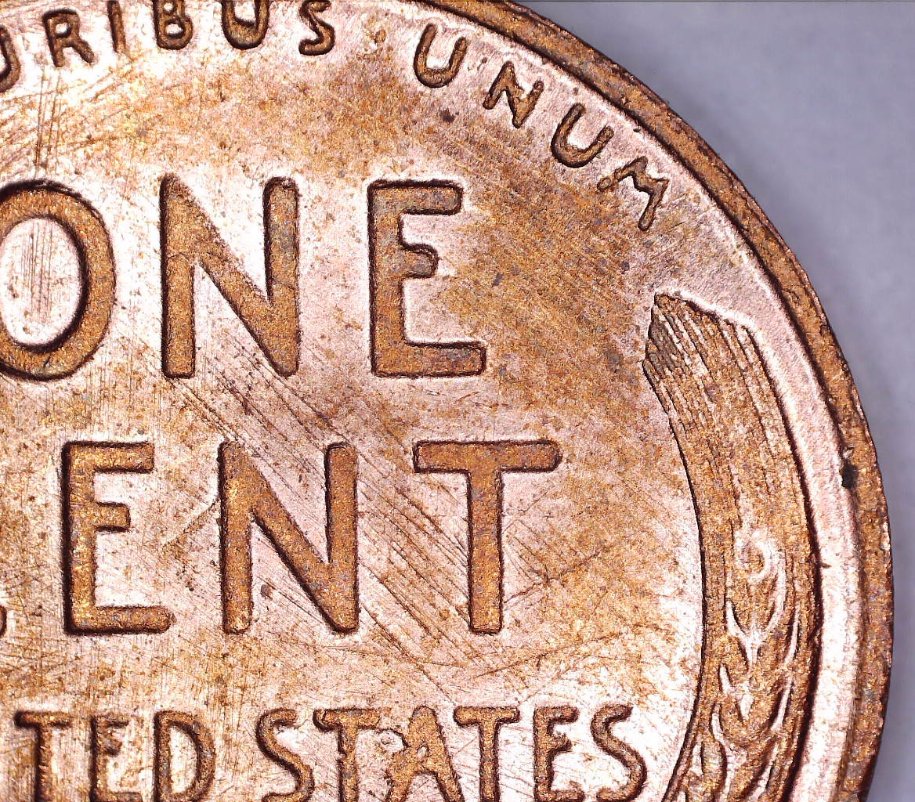 Strange-Non-Steel-1943-Cent-And-Another-Strange-1945-One-Cent-Coin