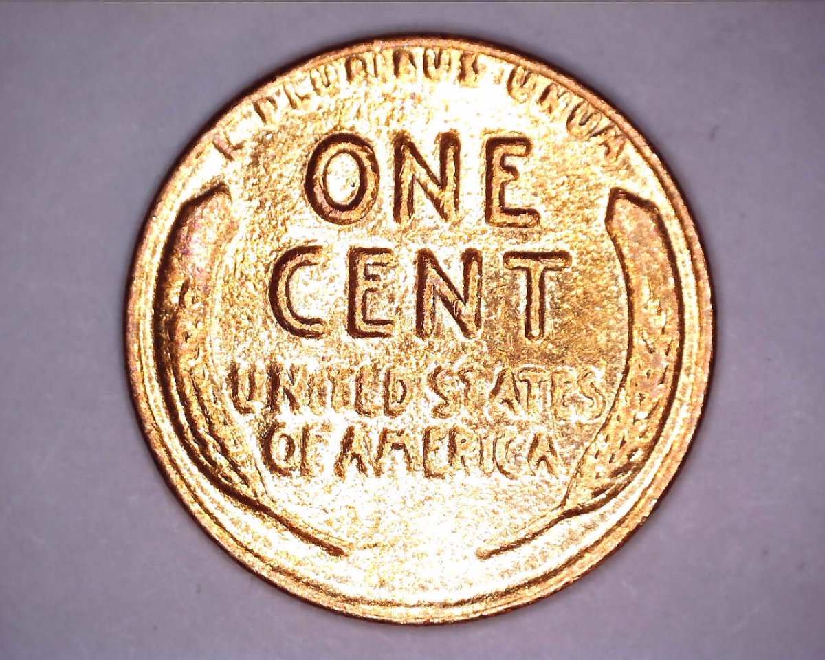 Strange-Non-Steel-1943-Cent-And-Another-Strange-1945-One-Cent-Coin