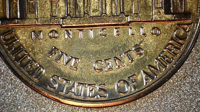 1987-P-Nickel-Interesting-Strike.