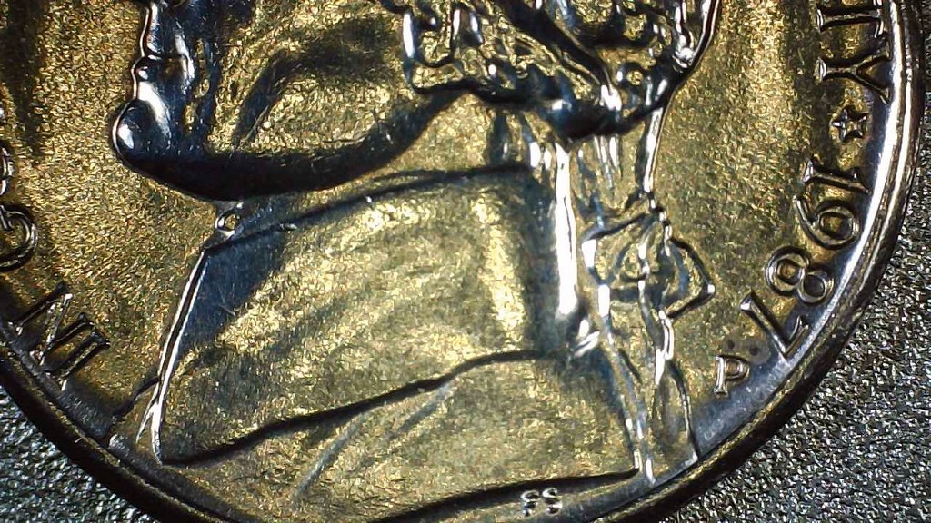 1987-P-Nickel-Interesting-Strike.