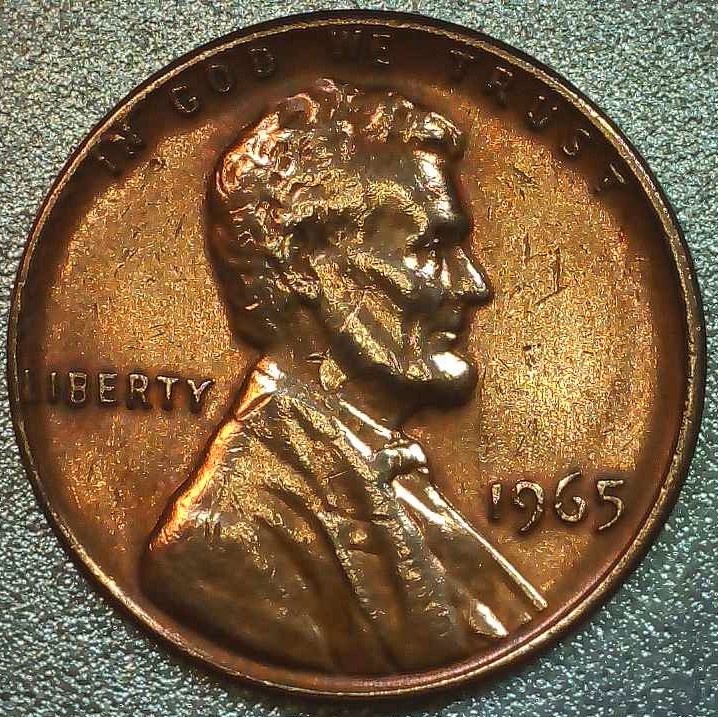 1965-P-Lincoln-Cent-With-An-Extra-Strip-Of-Copper-On-Obverse
