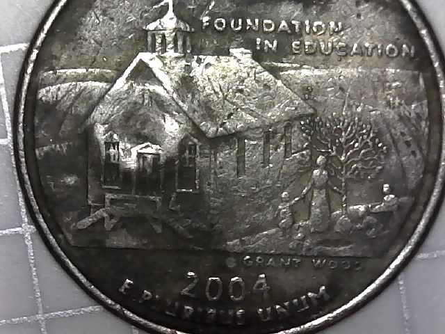 Posible-Mint-Error-Smudged-Or-Divited-Coin.-2004-Iowa-Quarter