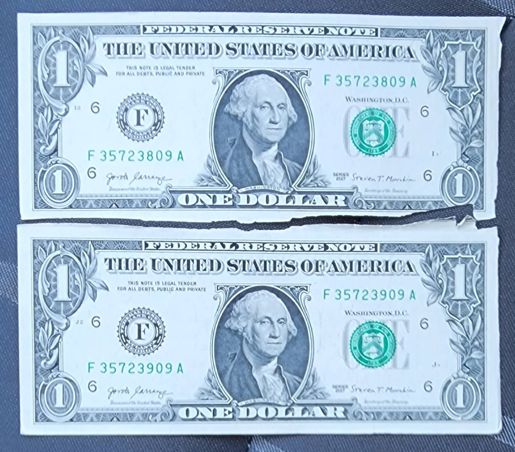 Note-Cutting-Error-On-4-2017-Series-One-Dollar-Bills?