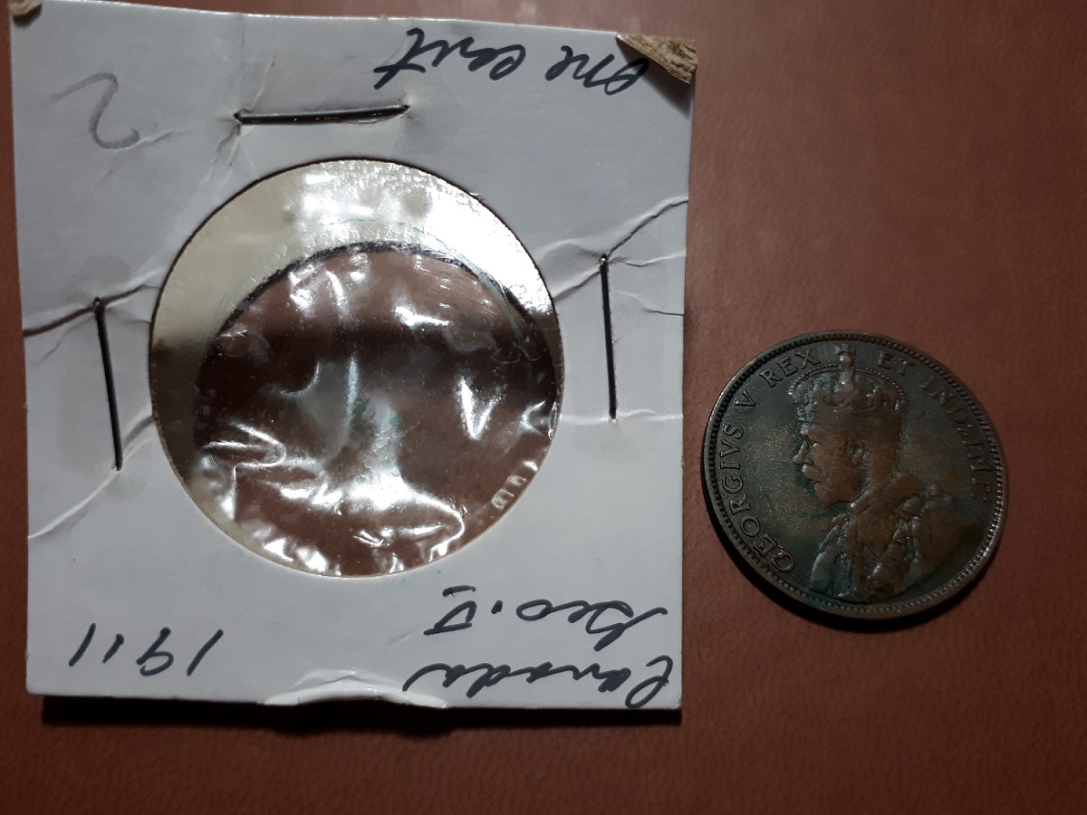 Coins-In-Holders-And-Plastic-Sheets-Sticky-And-Green