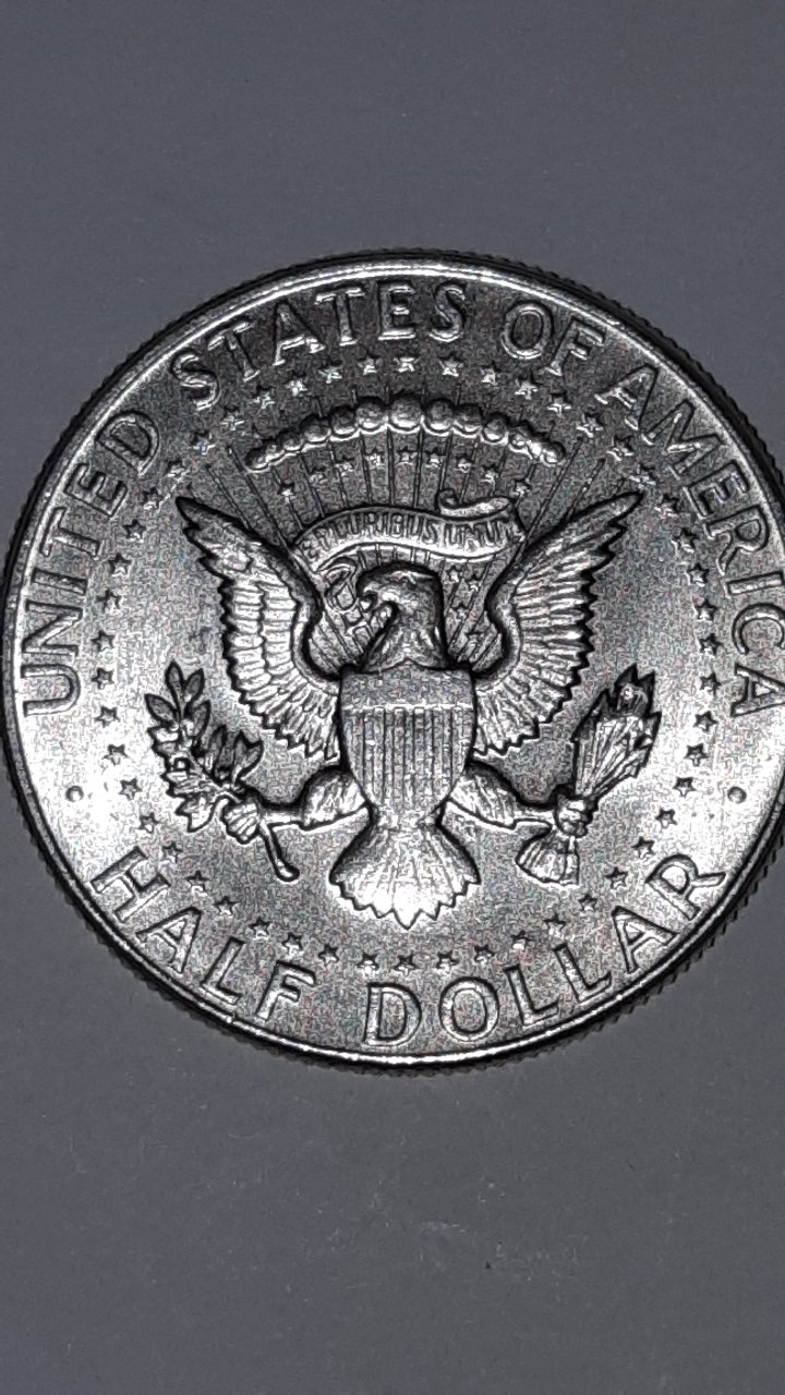 Kennedy-Half-1964-Mark-Behind-The-Head