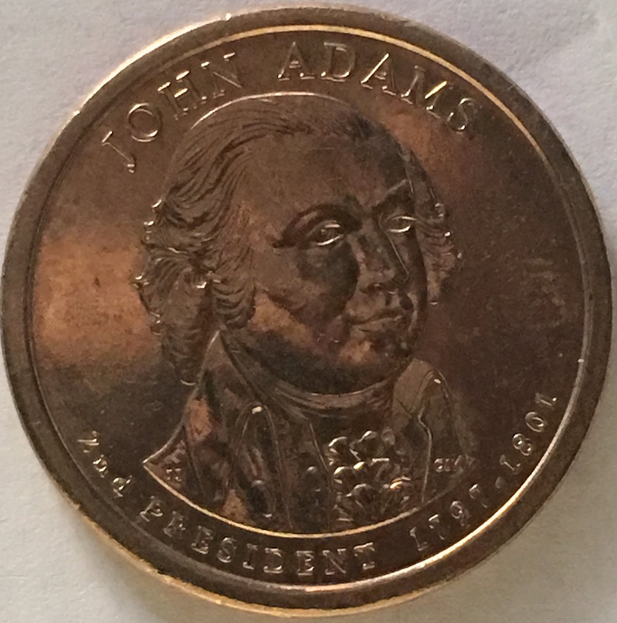 Why-Is-President's-Term-Written-Differently-For-A-Dollar-Coin
